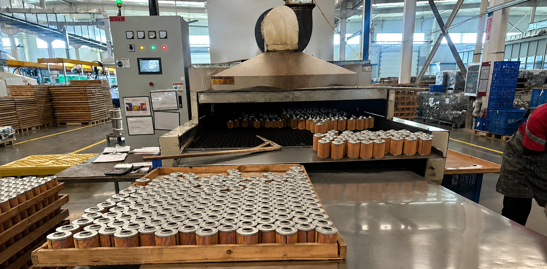 Automotive oil filter production line inside Beling manufacturing facility