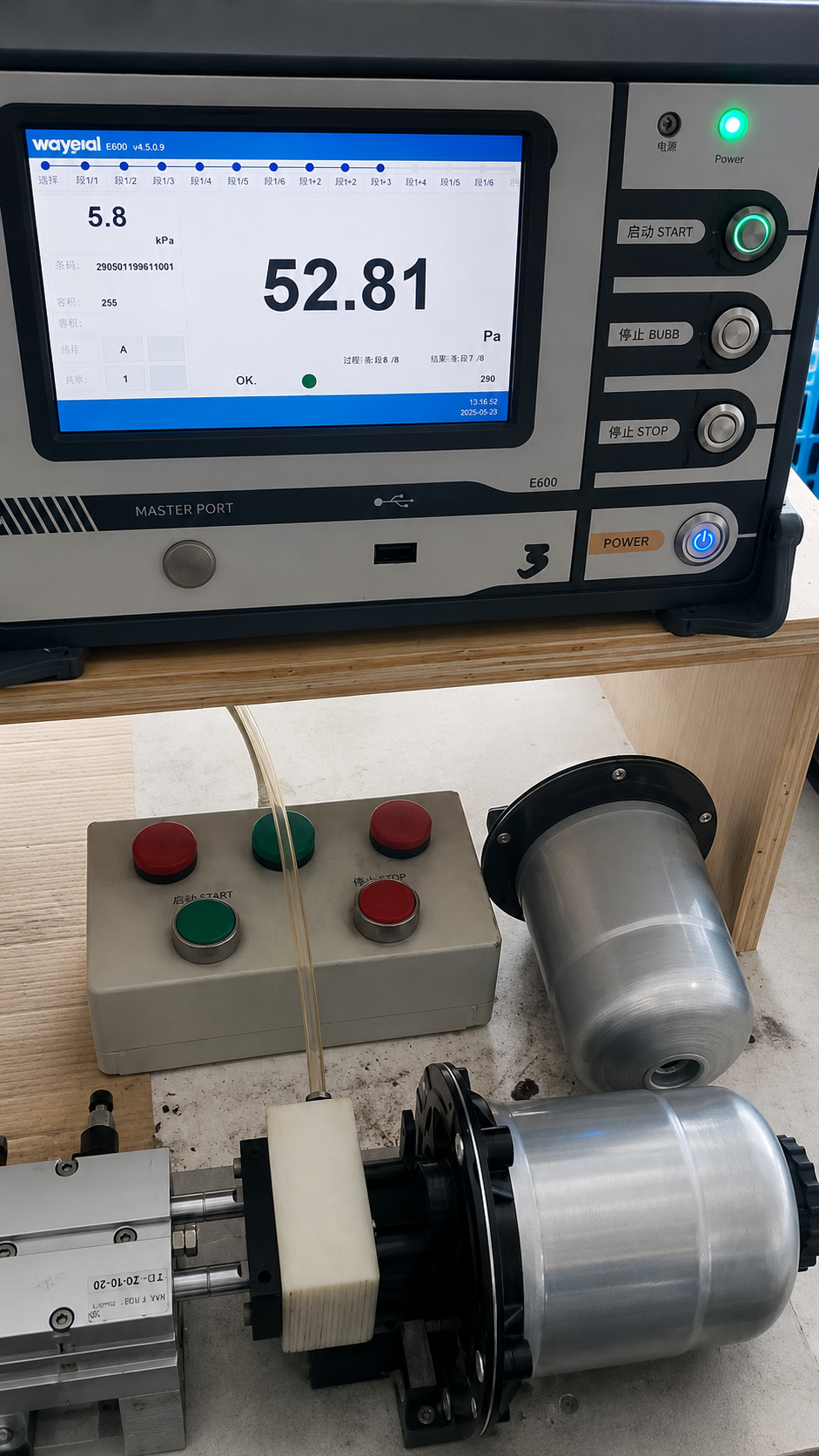 Fuel filter testing equipment showing pressure measurement during inspection